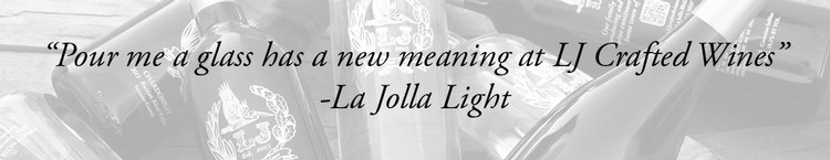 Background image showing various bottles of wine in a jumble. Text: "Pour me a glass has a new   meaning at LJ Crafted Wines: - La Jolla Light.